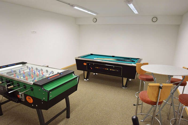 Games room with table football and billiards in the Nogglerhof